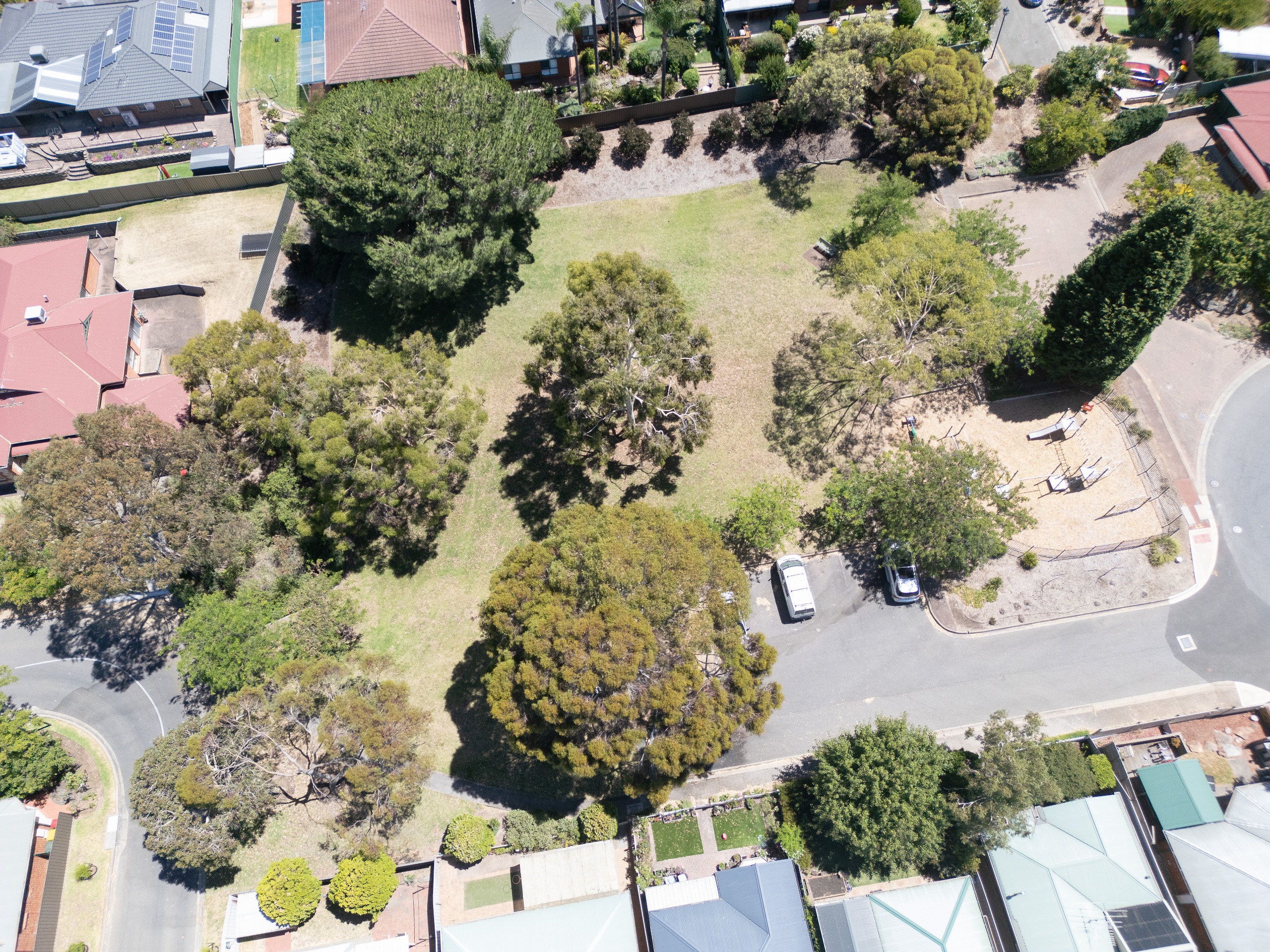 Aerial view showing playspace, trees and grassed area