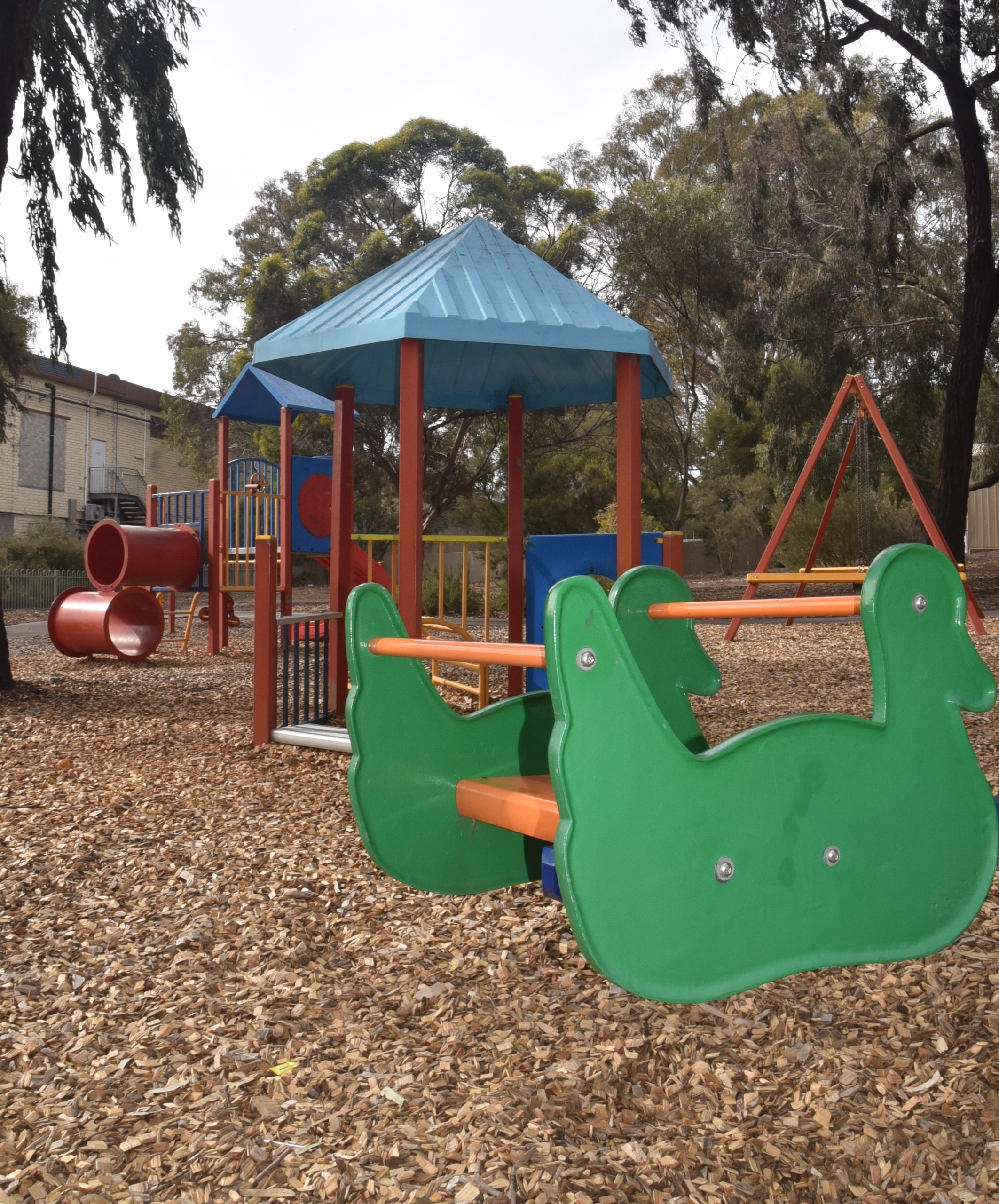 Green rocker in the shape of a duck